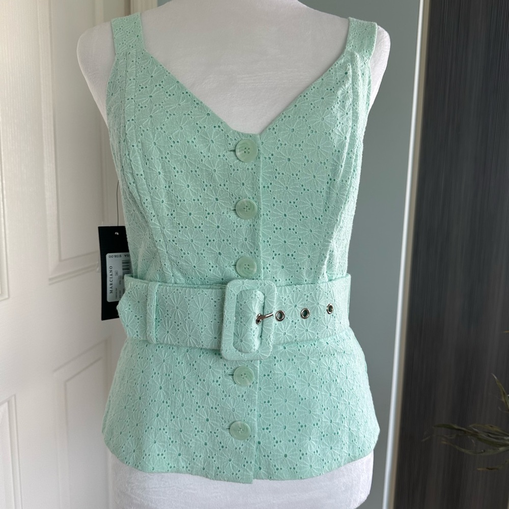 NWT. Guess mint top. Size XS.